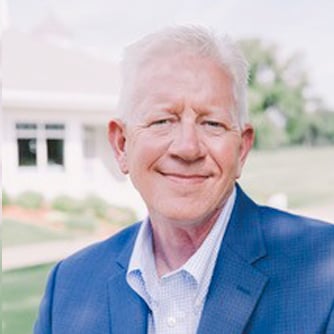 a headshot of douglas austin