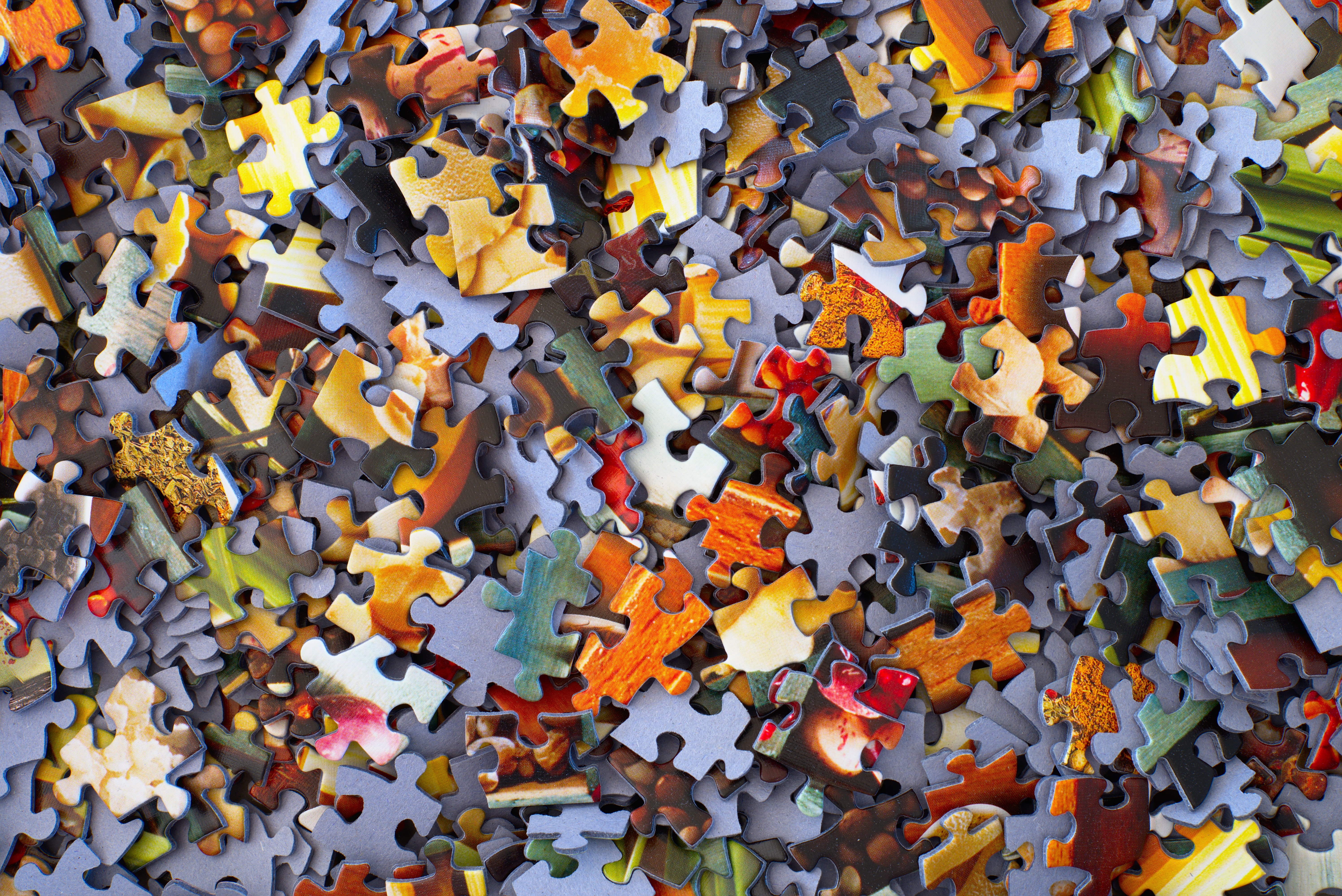 a pile of puzzle pieces